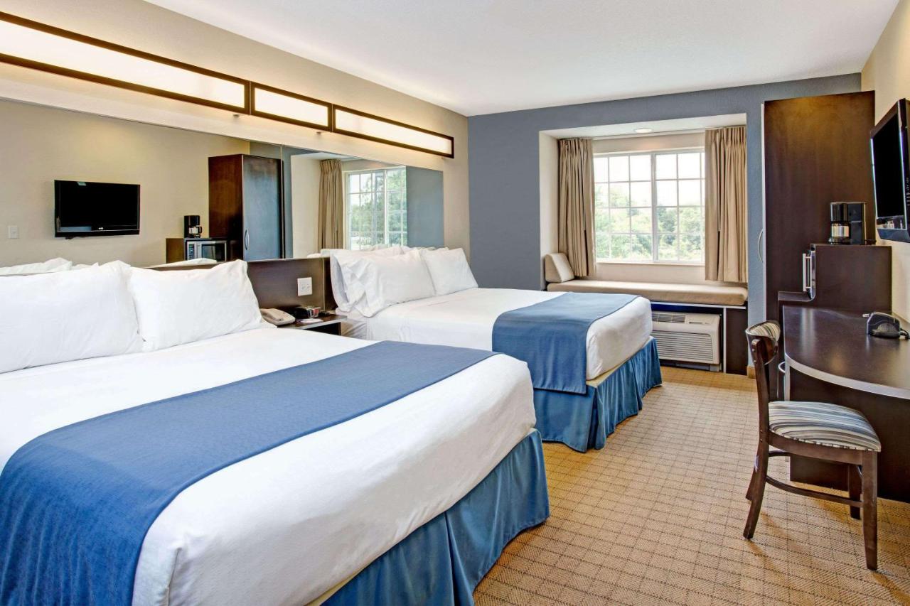 Queen Room with Two Queen Beds - Non-Smoking at Microtel Inn & Suites by Wyndham Brooksville