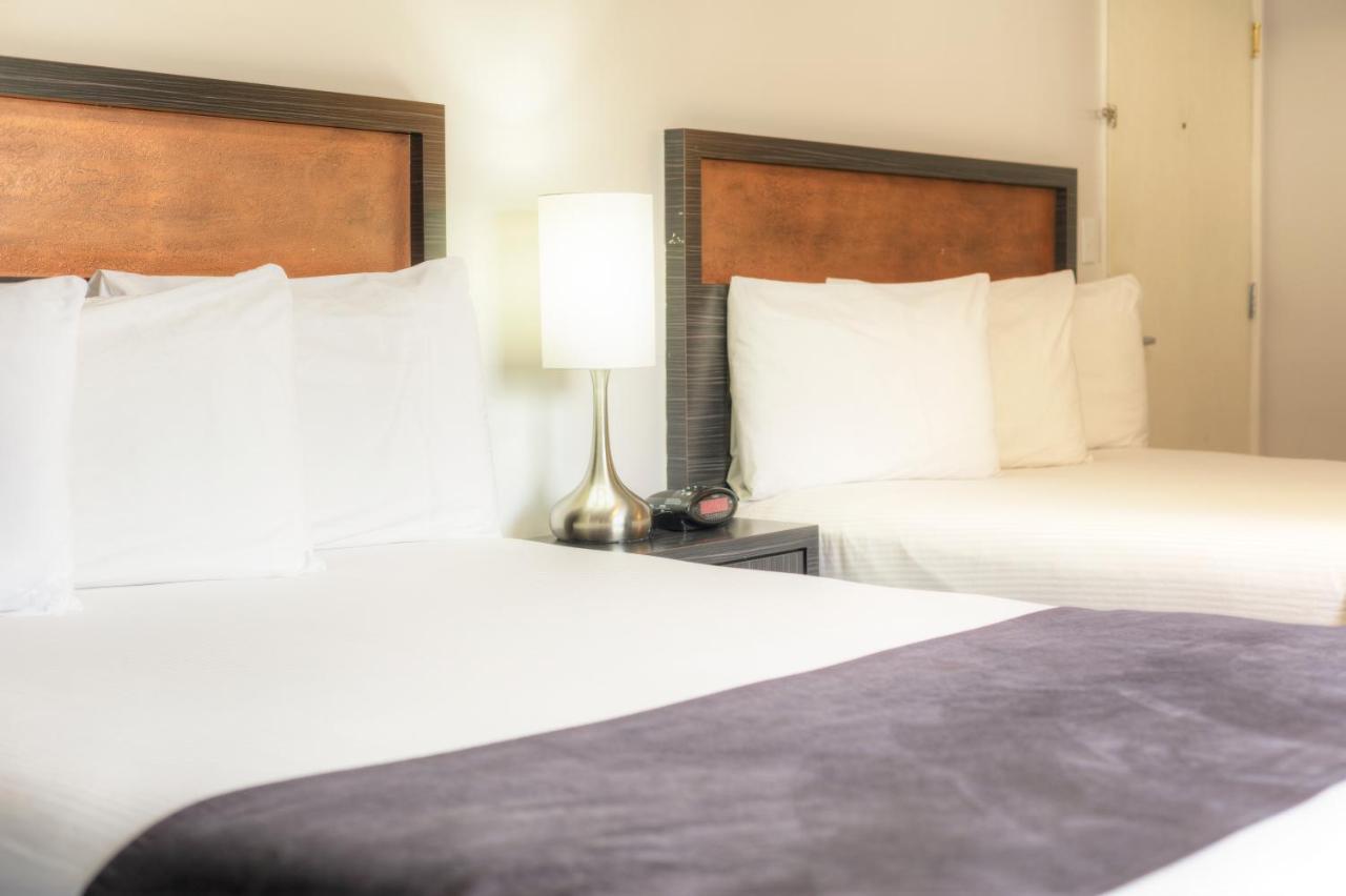 Queen Room with Two Queen Beds at Hotel Ruby