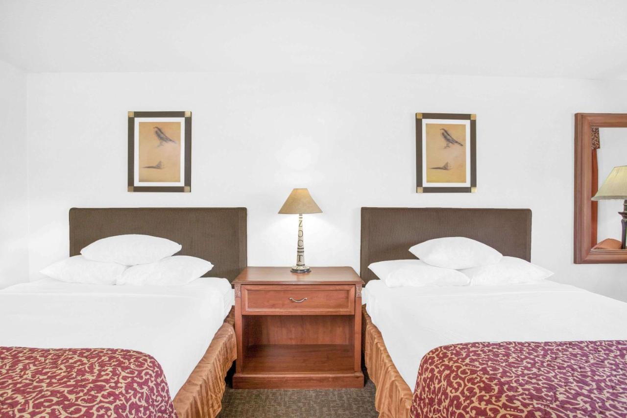 Queen Room with Two Queen Beds - Non-Smoking at Ramada by Wyndham Barstow