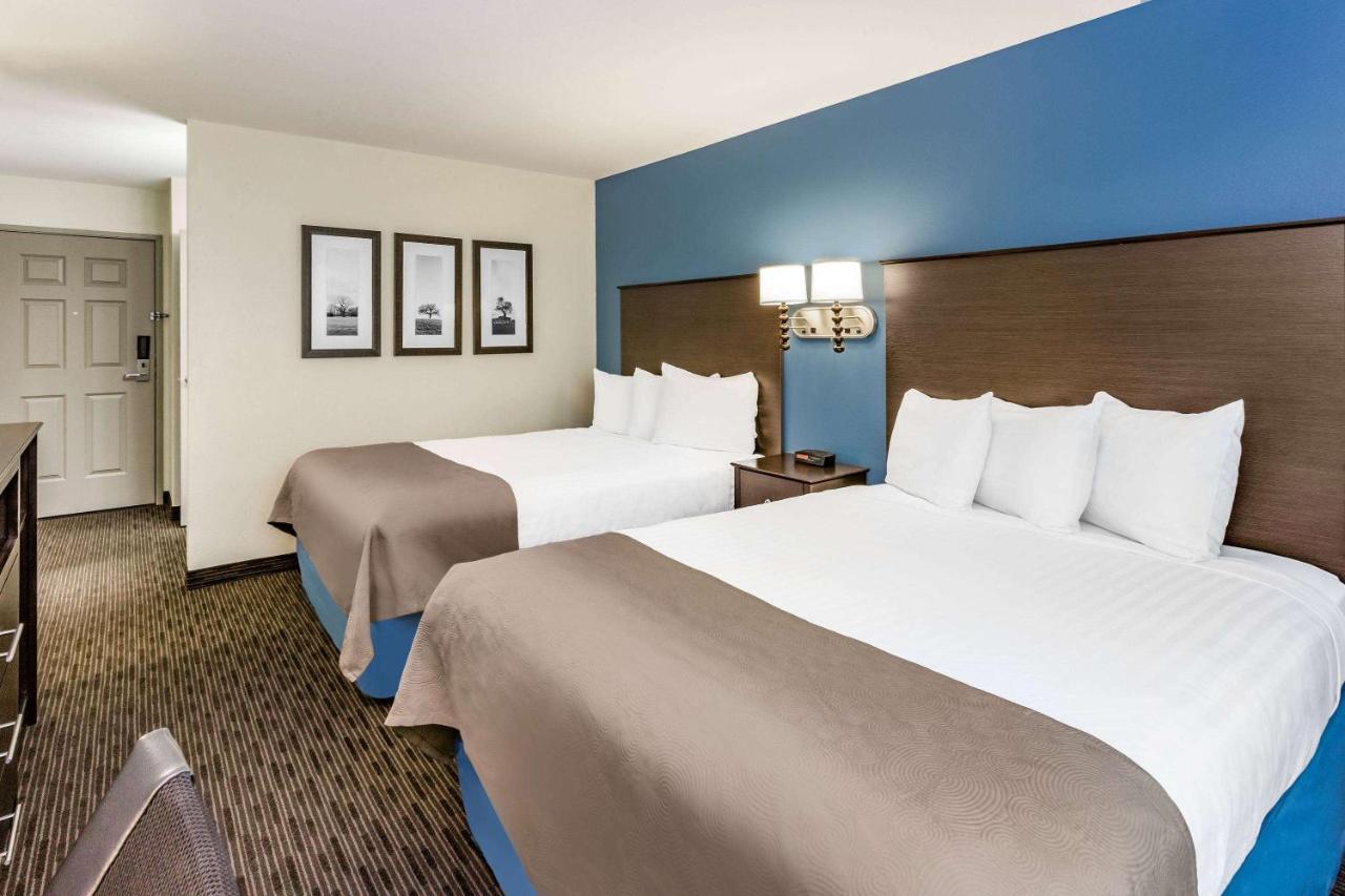 Queen Room with Two Queen Beds - Non-Smoking at AmericInn by Wyndham Burnsville
