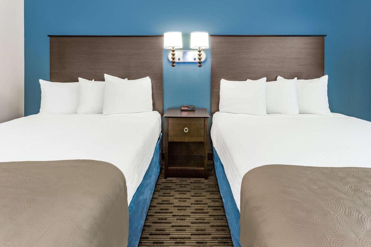 Queen Room with Two Queen Beds - Non-Smoking at AmericInn by Wyndham Burnsville