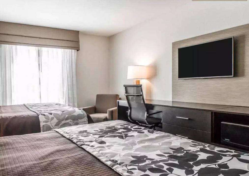 Standard Queen Room with Two Queen Beds at Sleep Inn & Suites Hannibal West