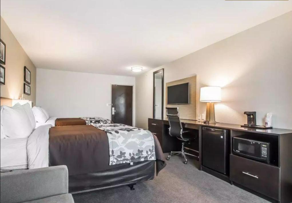 Standard Queen Room with Two Queen Beds at Sleep Inn & Suites Hannibal West
