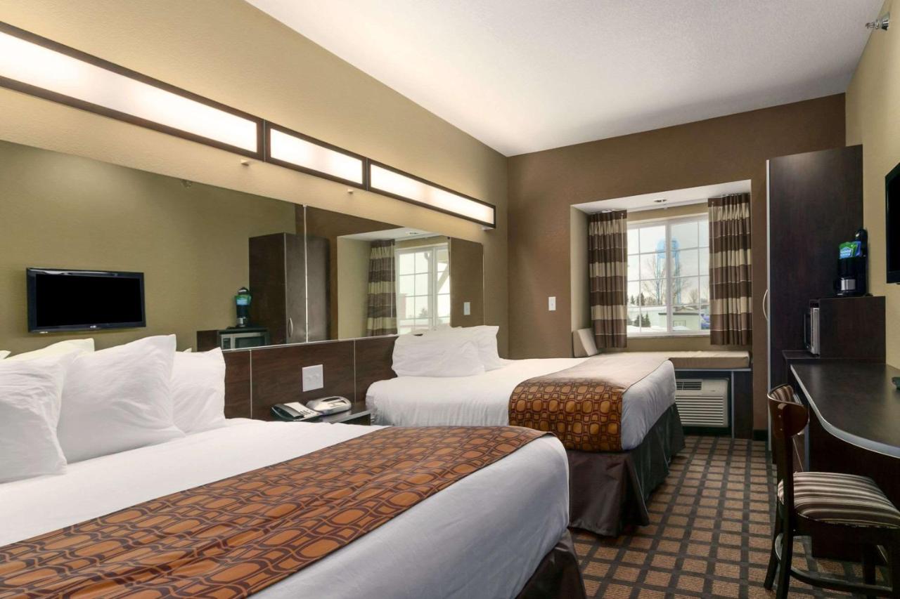 Queen Room with Two Queen Beds - Non-Smoking at Microtel Inn & Suites by Wyndham Minot