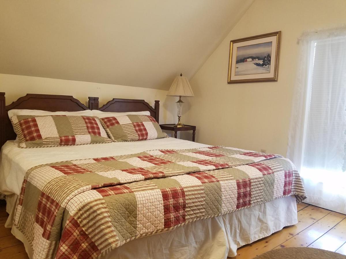 King Room at 1860 House Inn and Vacation Rental Home