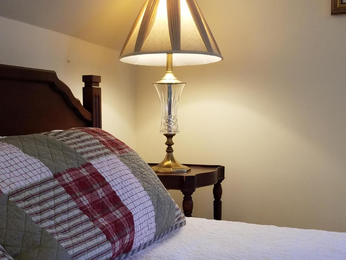 King Room at 1860 House Inn and Vacation Rental Home
