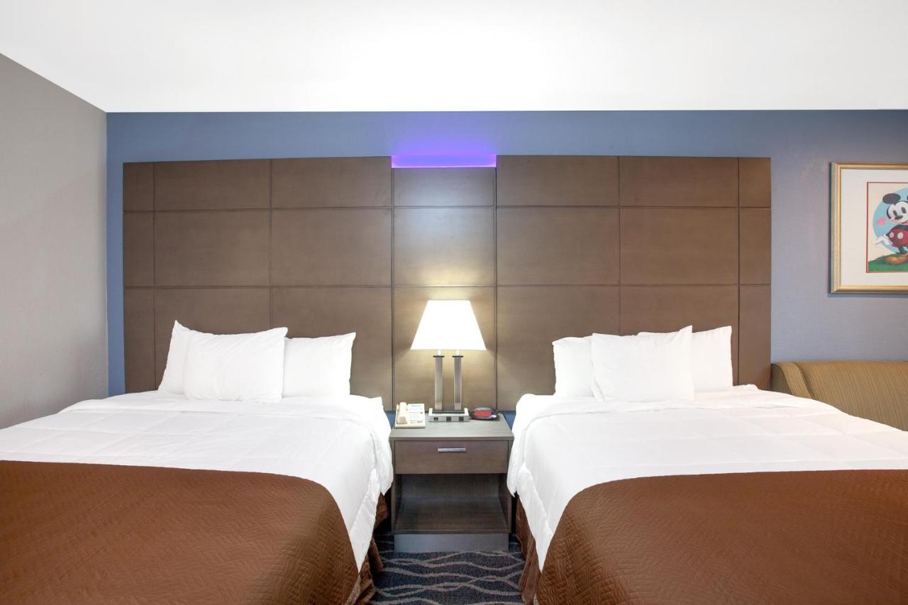 Deluxe Queen Room with Two Queen Beds - Non-Smoking at Travelodge Inn & Suites by Wyndham Anaheim on Disneyland Dr