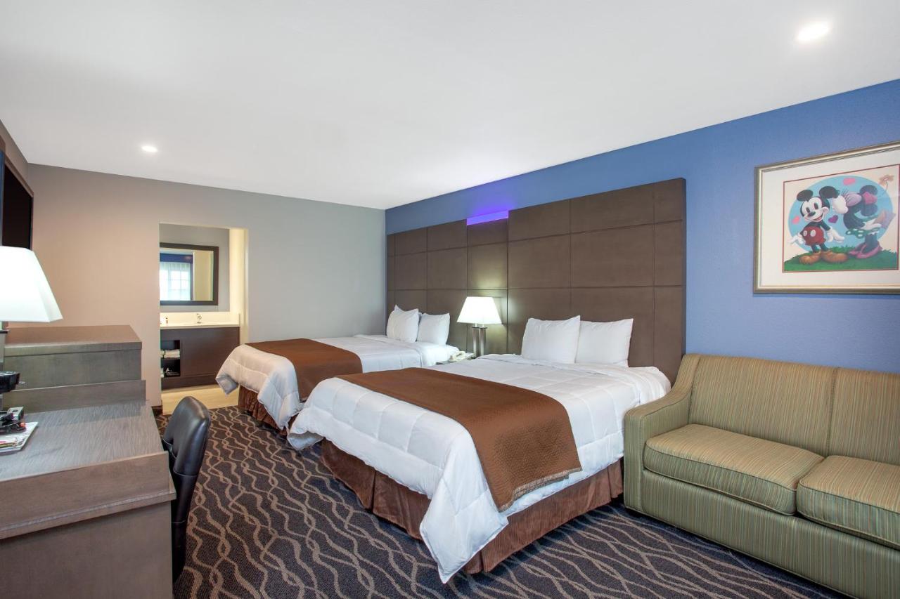 Deluxe Queen Room with Two Queen Beds - Non-Smoking at Travelodge Inn & Suites by Wyndham Anaheim on Disneyland Dr