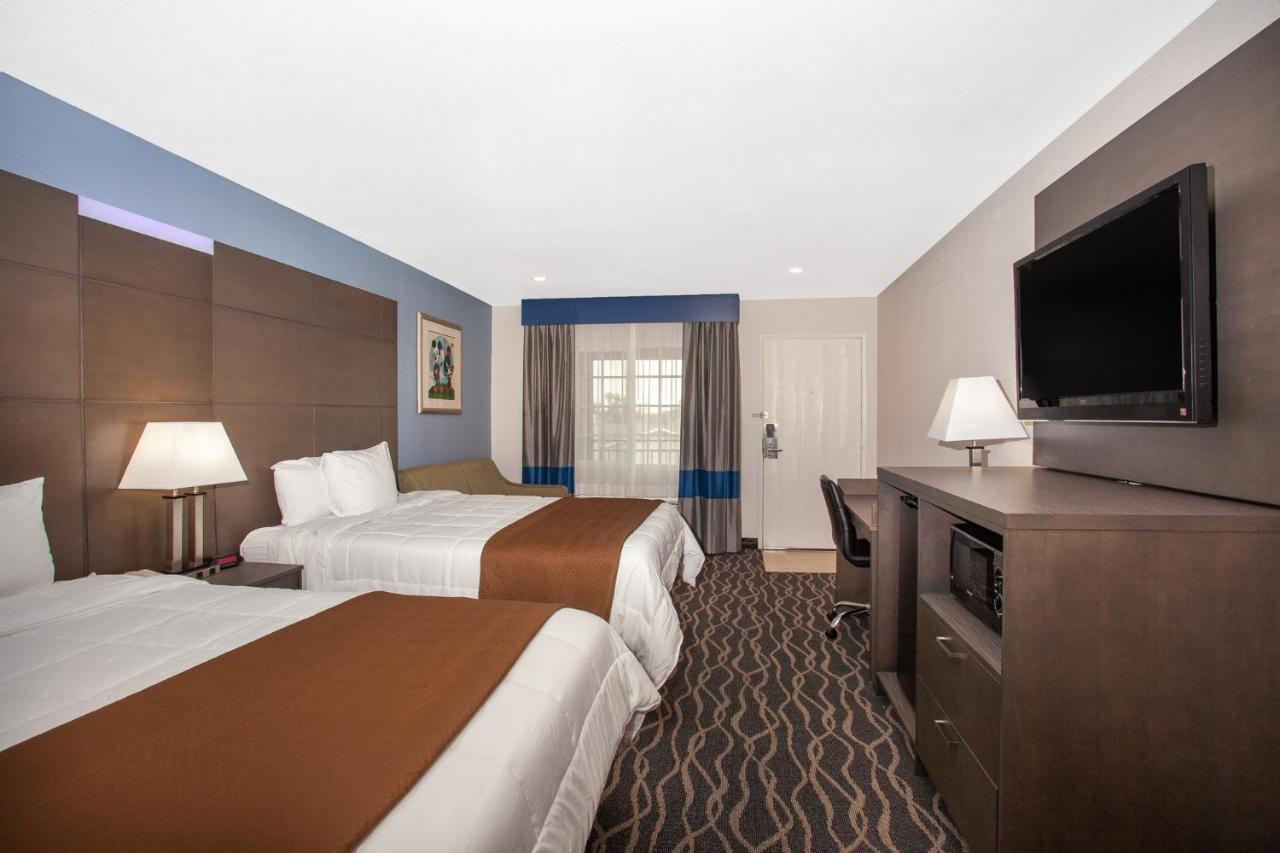 Deluxe Queen Room with Two Queen Beds - Non-Smoking at Travelodge Inn & Suites by Wyndham Anaheim on Disneyland Dr