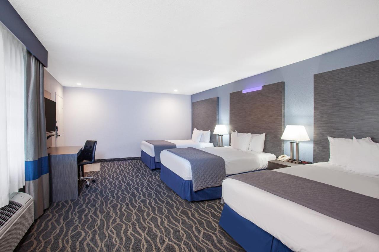 Queen Suite with Three Queen Beds - Non-Smoking at Travelodge Inn & Suites by Wyndham Anaheim on Disneyland Dr