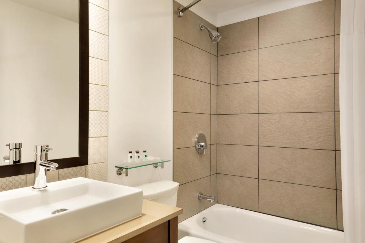 Queen Room with Two Queen Beds at Country Inn & Suites by Radisson, Brooklyn Park - Brooklyn Center, MN