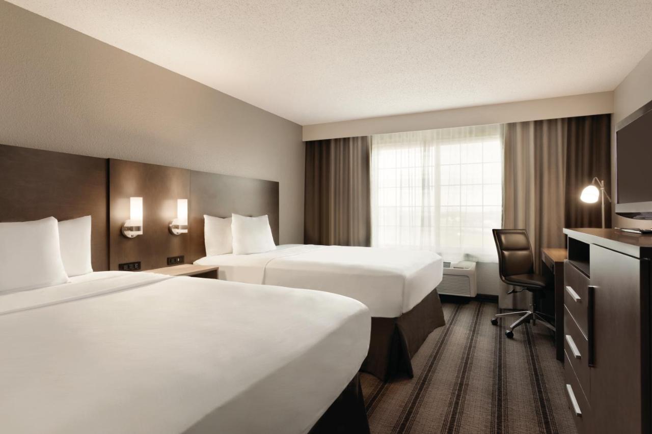 Queen Room with Two Queen Beds at Country Inn & Suites by Radisson, Indianapolis Airport South, IN