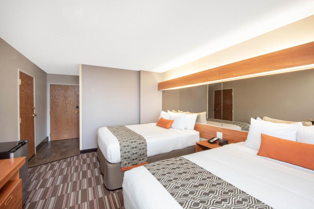 Queen Room with Two Queen Beds - Non-Smoking at Microtel Inn & Suites by Wyndham Springfield