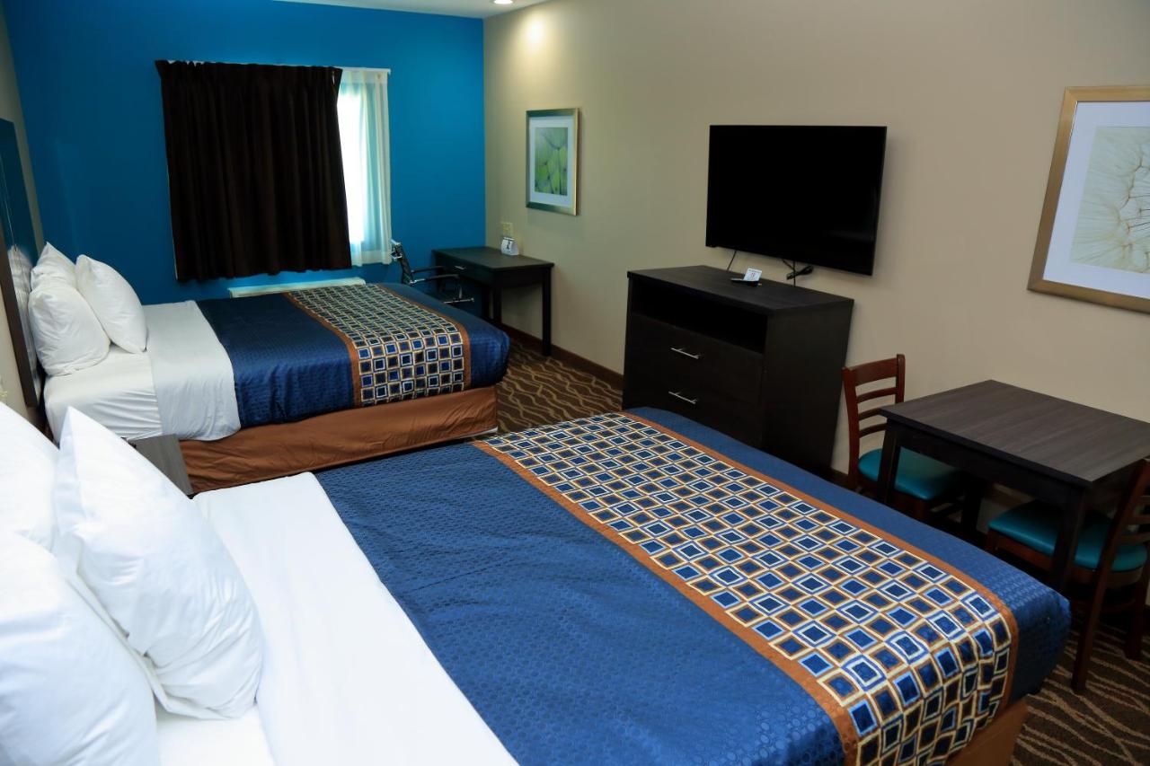 2 Queen Beds Kitchenette NS at Americas Best Value Inn & Suites Prairieville