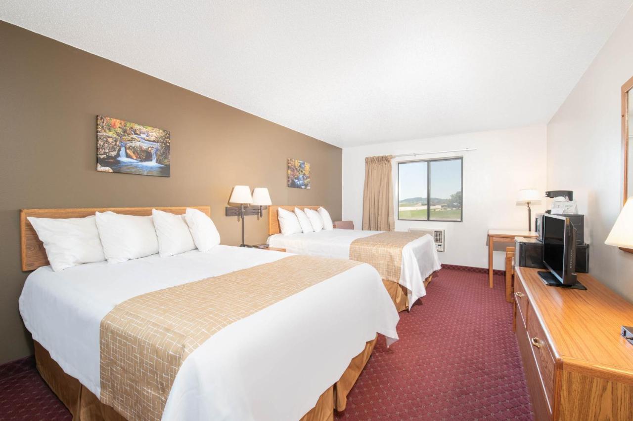 Queen Room with Two Queen Beds - Non-Smoking at Travelodge by Wyndham Spearfish