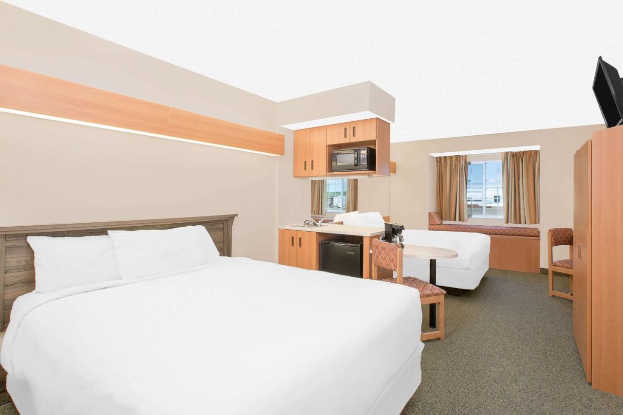 Deluxe Business Queen Room with Two Queen Beds - Non-Smoking at Microtel Inn & Suites by Wyndham Colfax/Newton