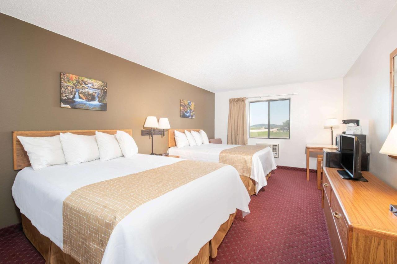 Queen Room with Two Queen Beds - Non-Smoking at Travelodge by Wyndham Spearfish