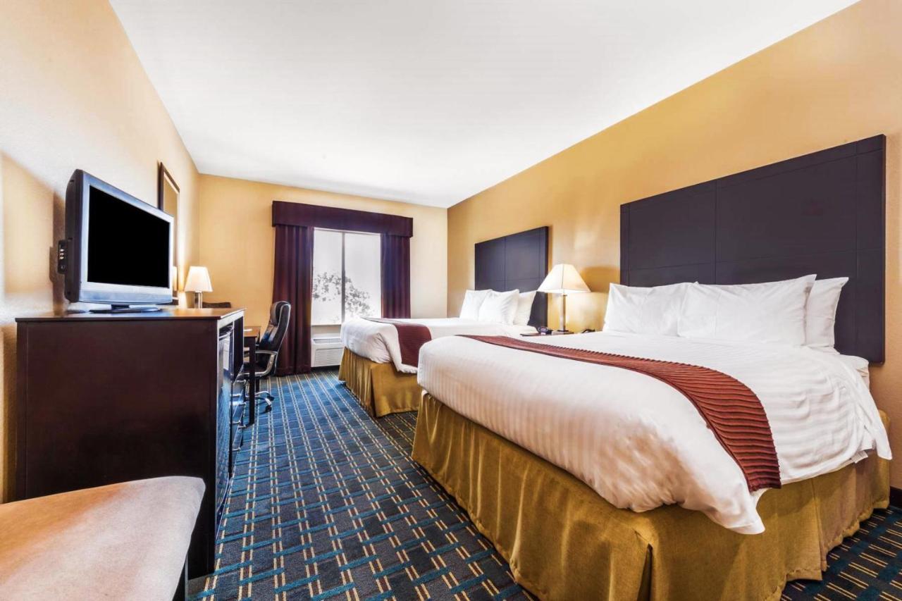 Queen Room with Two Queen Beds -Disability Access - Non-Smoking at Days Inn & Suites by Wyndham Mineral Wells