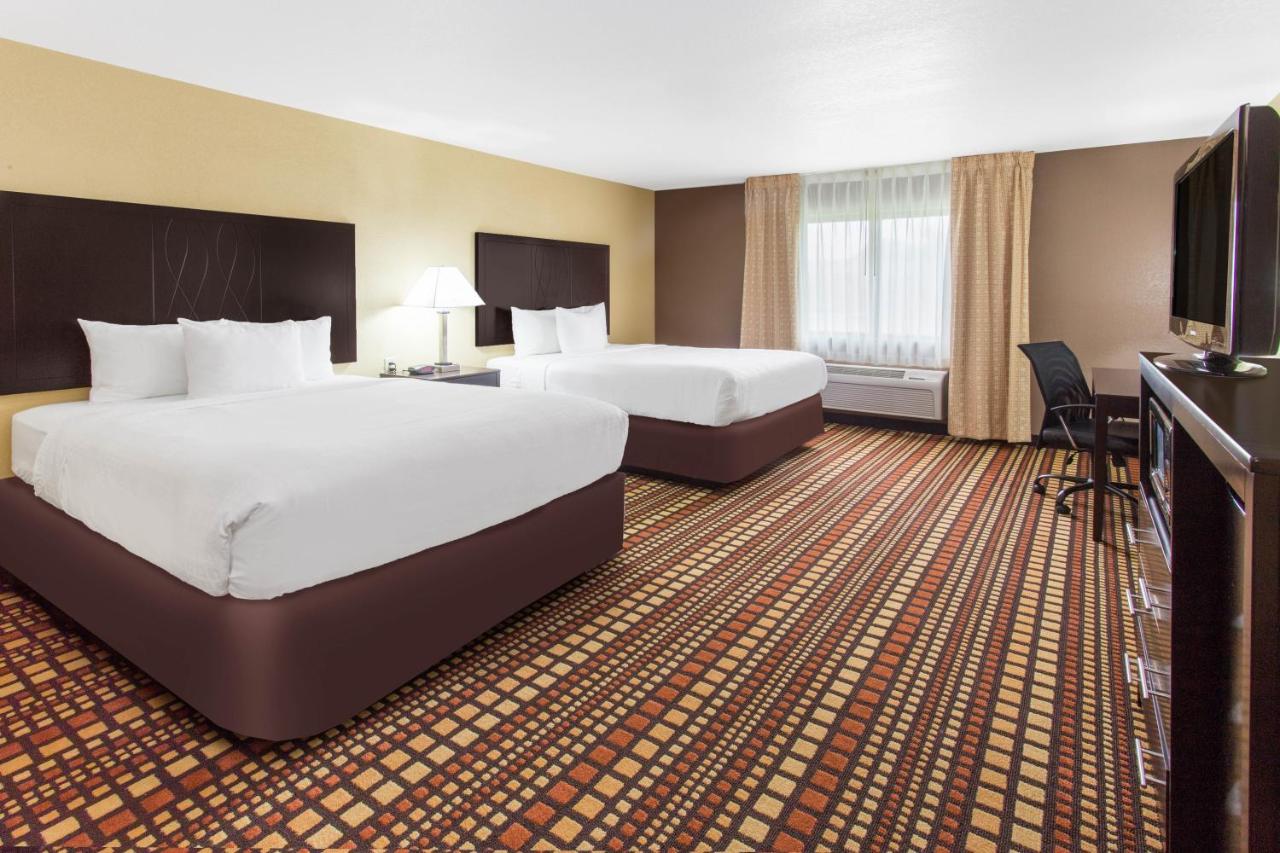 Queen Room with Two Queen Beds - Non-Smoking at Days Inn & Suites by Wyndham Davenport East