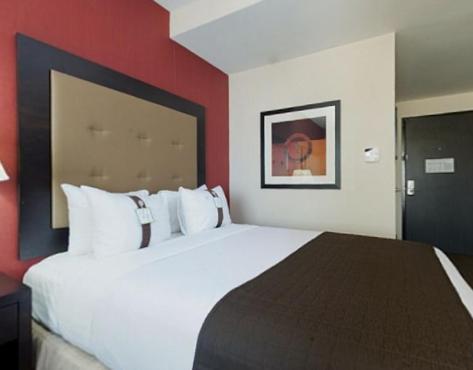 Queen Room with Two Queen Beds at Holiday Inn DFW South by IHG