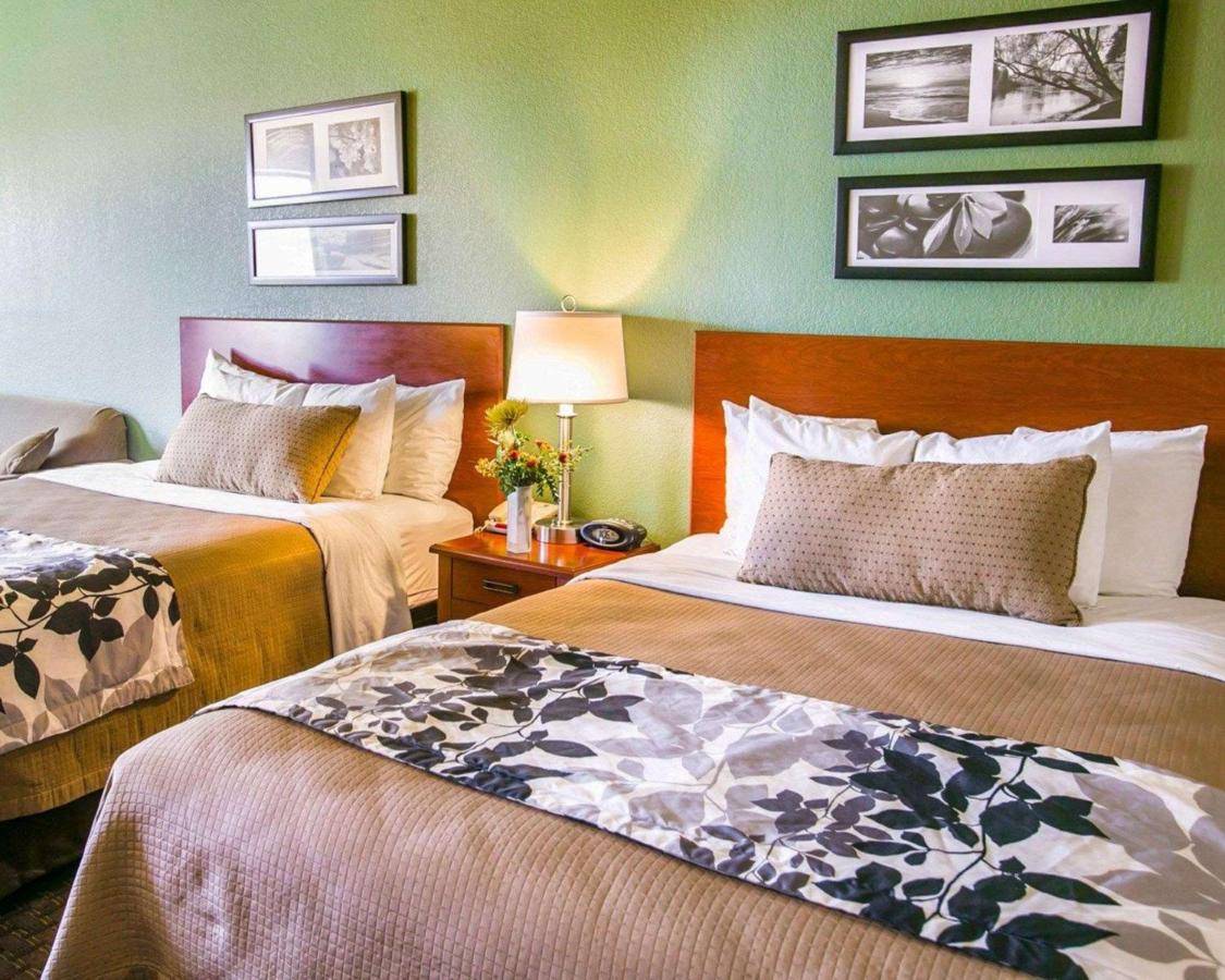 Queen Room with Two Queen Beds - Non-Smoking at Sleep Inn & Suites Gonzales near Palmetto State Park
