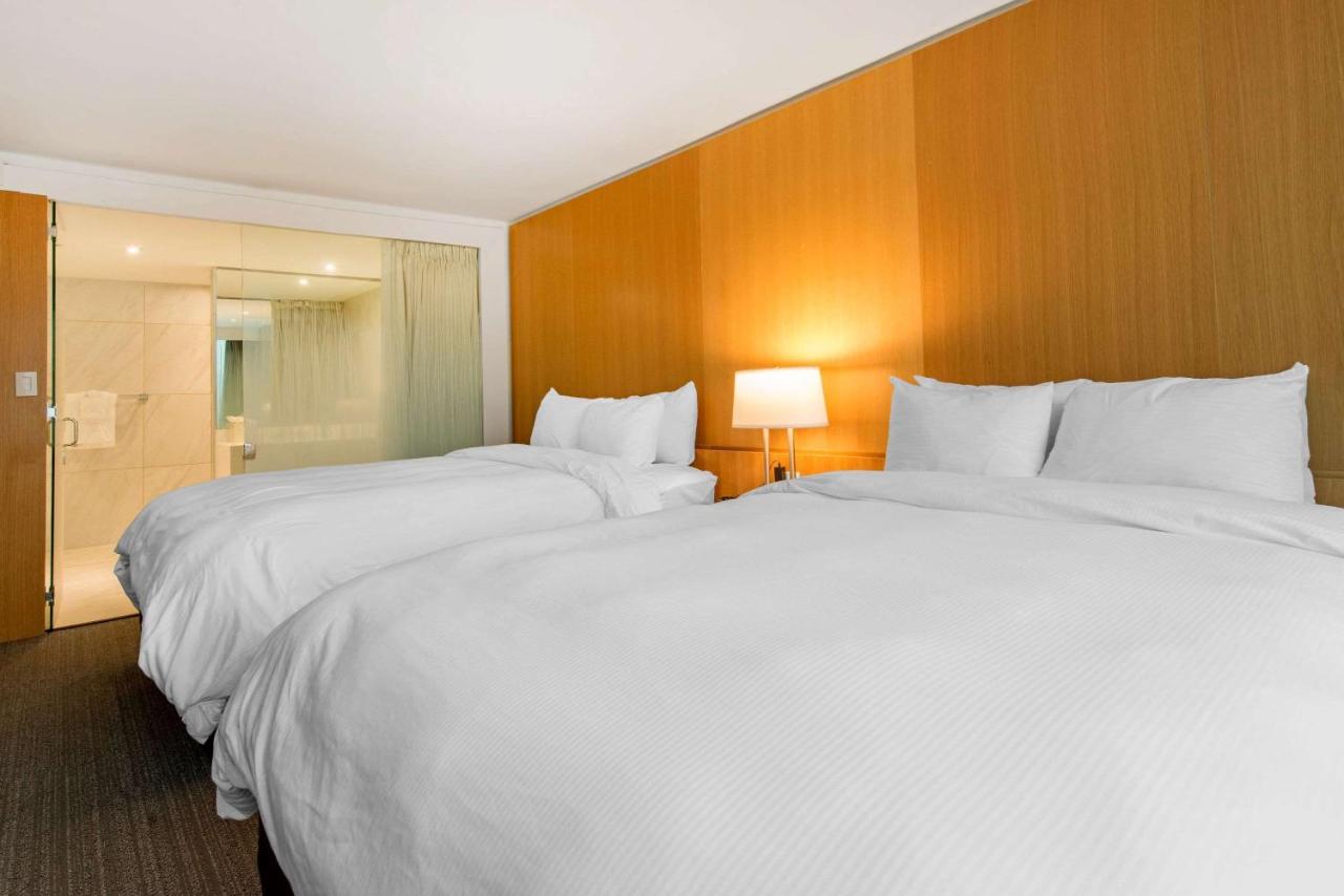 Queen Suite with Two Queen Beds at West Wing Hotel, an Ascend Hotel Collection Member