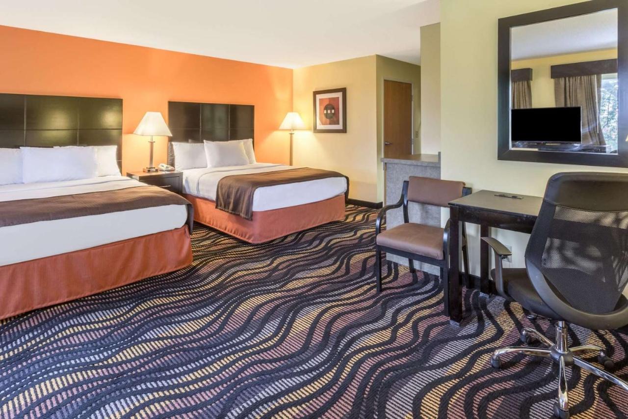 Studio Suite with Three Queen Beds - Non-Smoking at AmericInn by Wyndham Streator