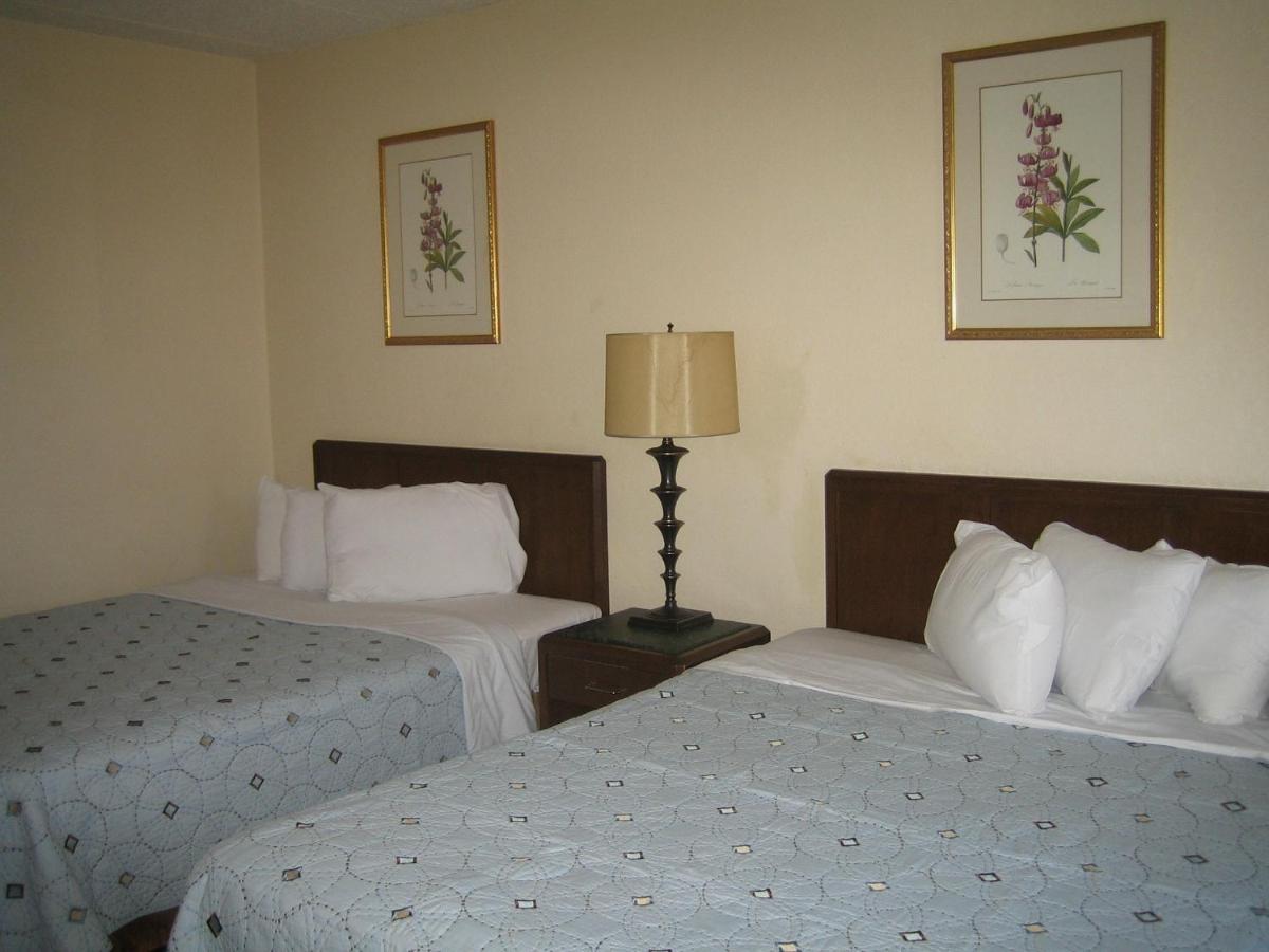 Queen Room with Two Queen Beds at Knights Inn Litchfield