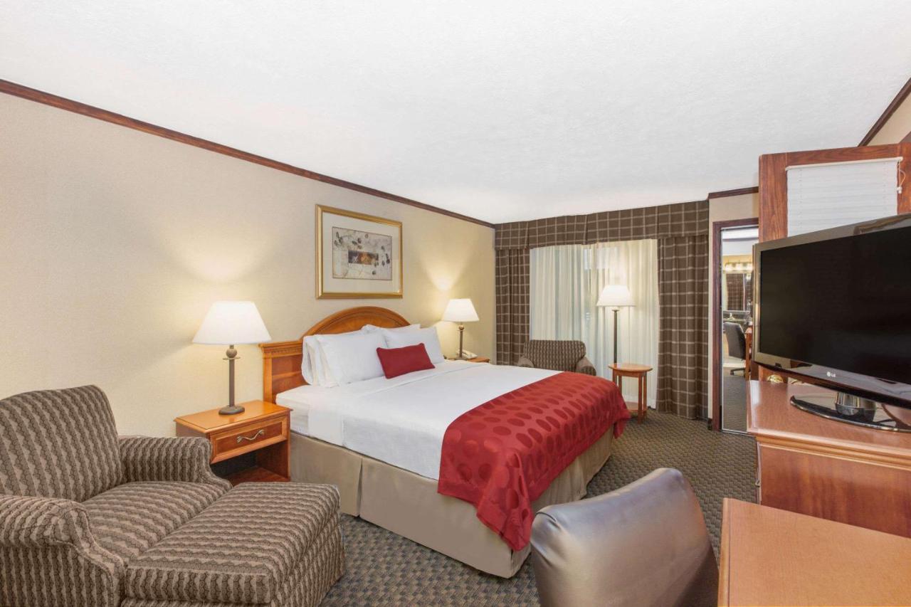 1 King Bed, One-Bedroom, Superior Suite, Pool Side, Non-Smoking at Ramada by Wyndham Midtown Grand Island