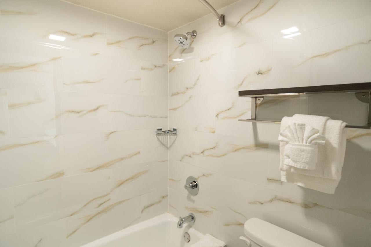 Queen Room with Two Queen Beds at SureStay Plus Hotel by Best Western Point Richmond