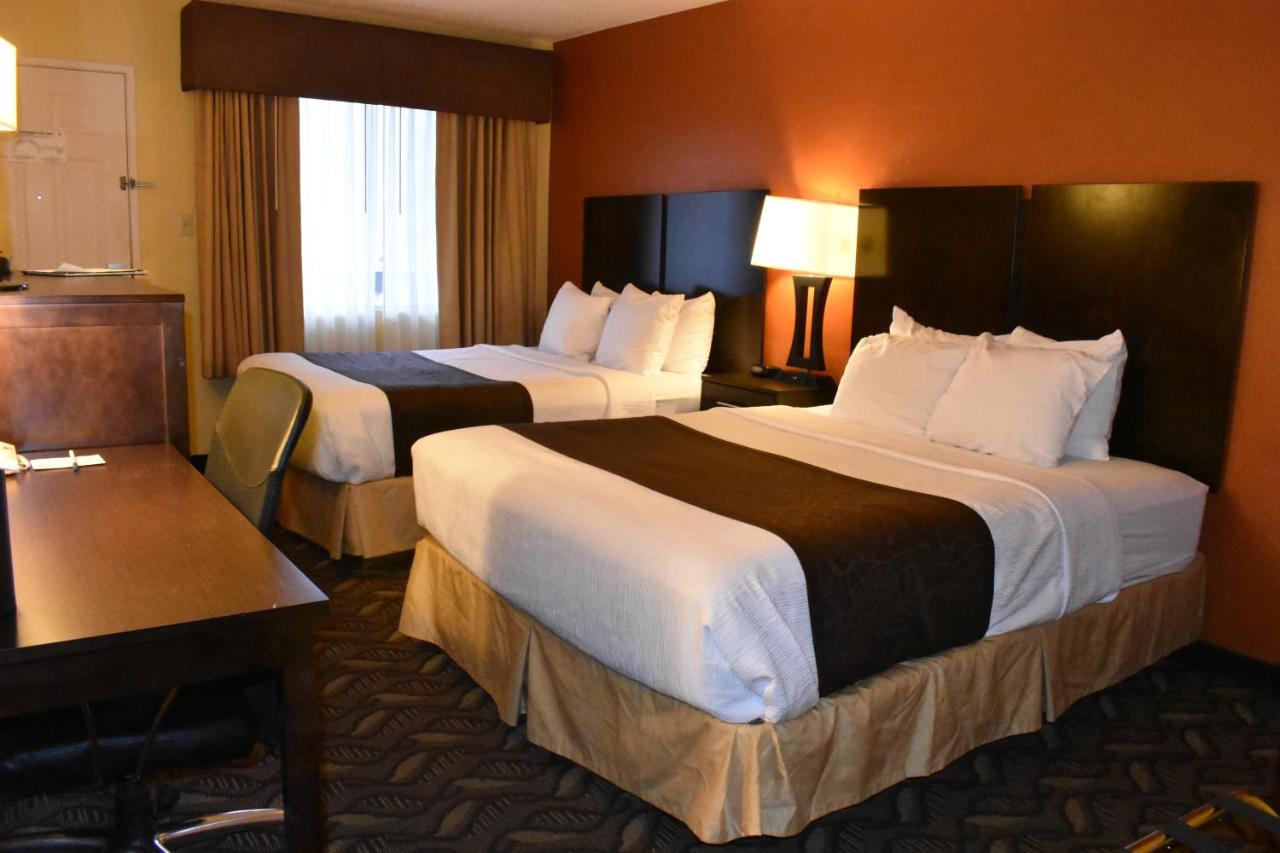 Queen Room with Two Queen Beds and One Double Bed - Non-Smoking at Best Western Durango Inn & Suites