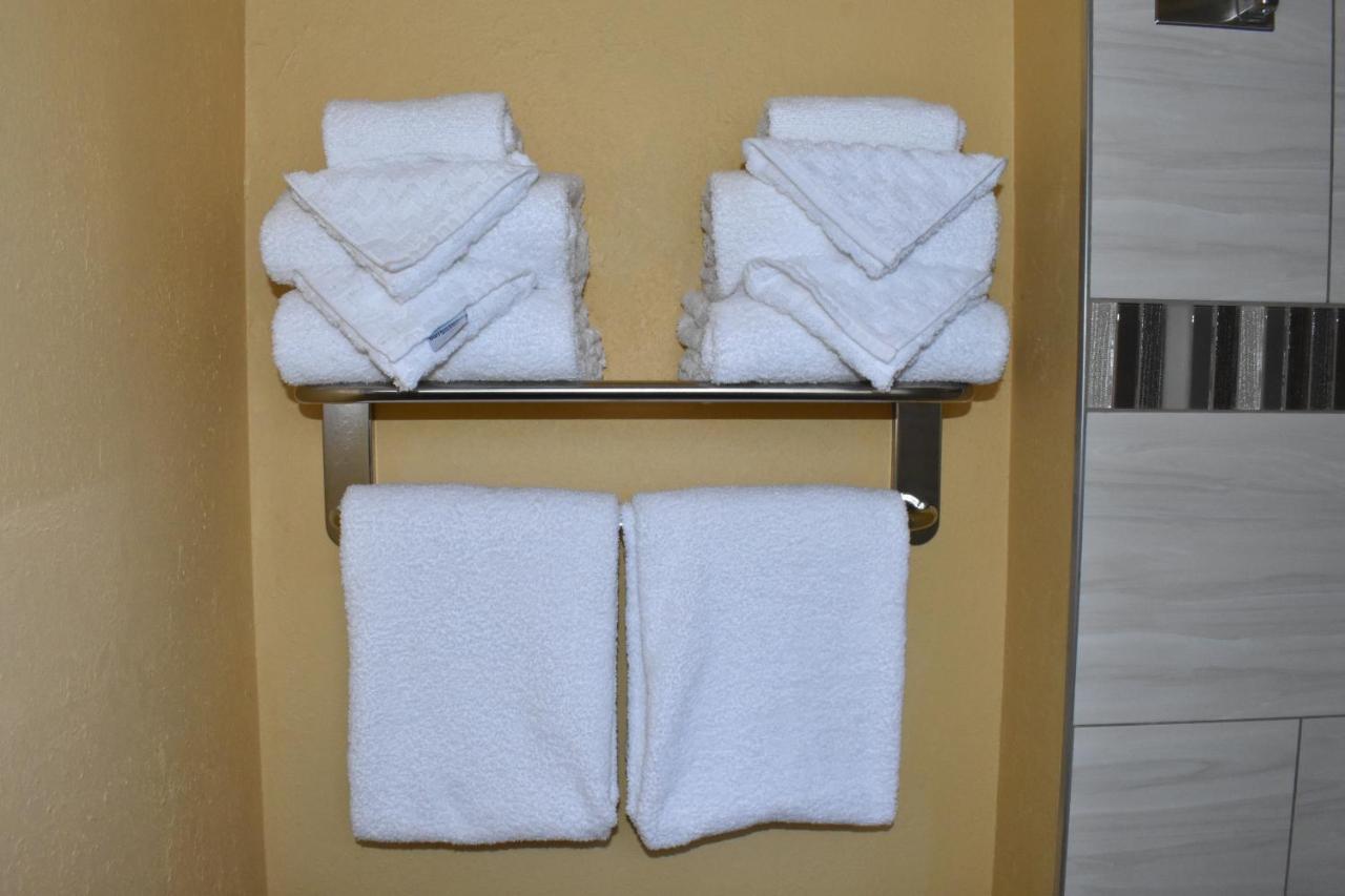 Queen Room with Two Queen Beds and One Double Bed - Non-Smoking at Best Western Durango Inn & Suites