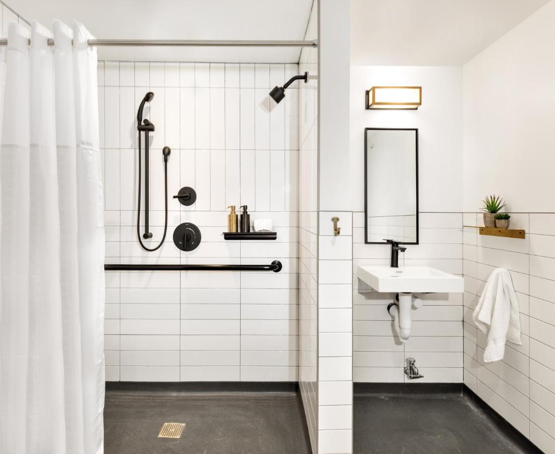 Accessible King Room Bathroom Down the Hall at The Revolution Hotel