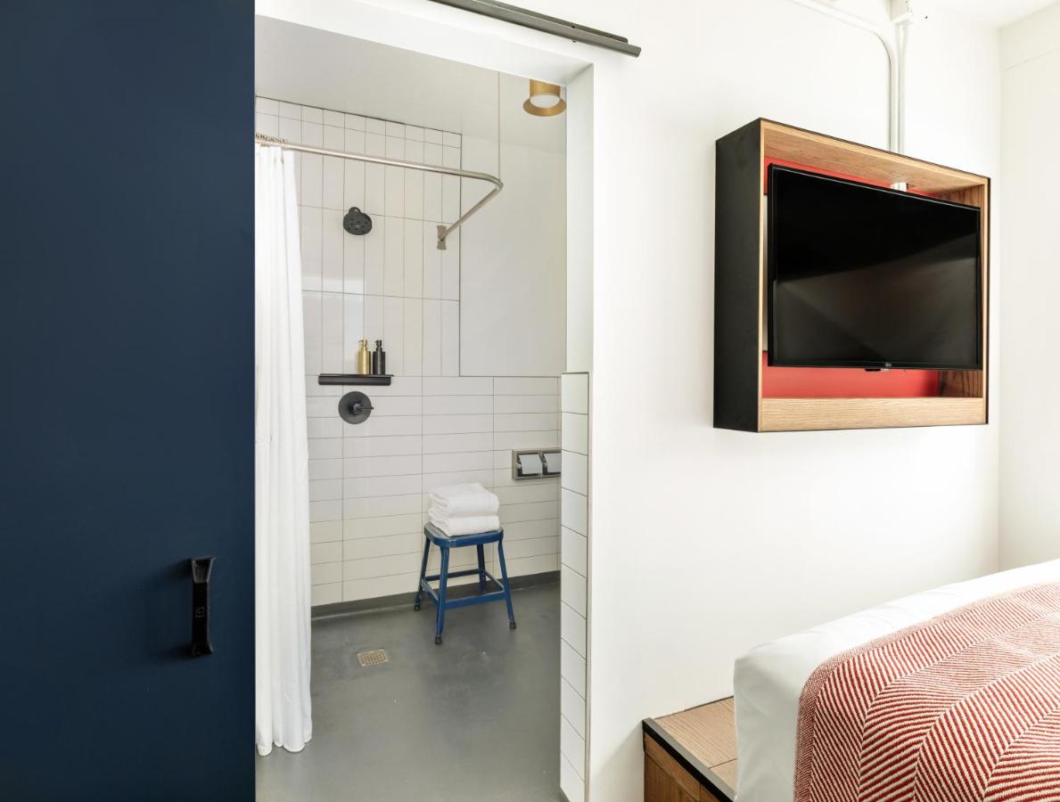 Accessible King Room Bathroom in Room at The Revolution Hotel