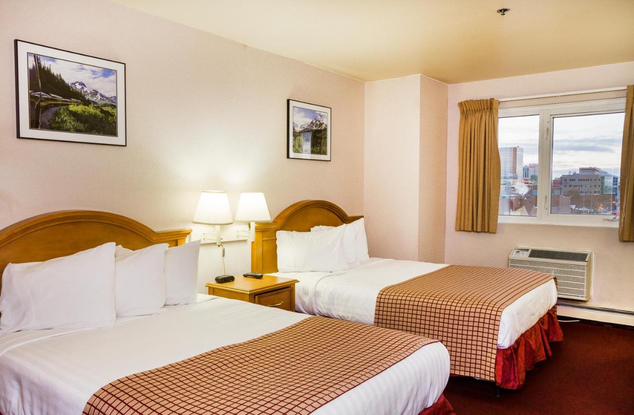 Deluxe Queen Room with Two Queen Beds at GuestHouse Anchorage