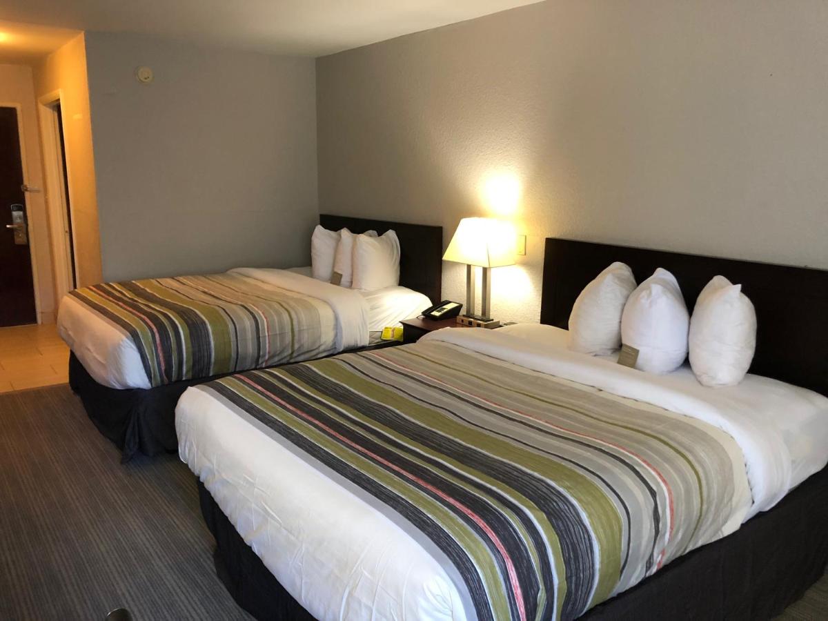 Queen Room with Two Queen Beds - Non-Smoking at Country Inn & Suites by Radisson, Greenville, NC