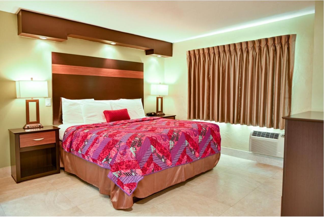 Honeymoon Suite with King Bed at Beachcomber Resort & Club