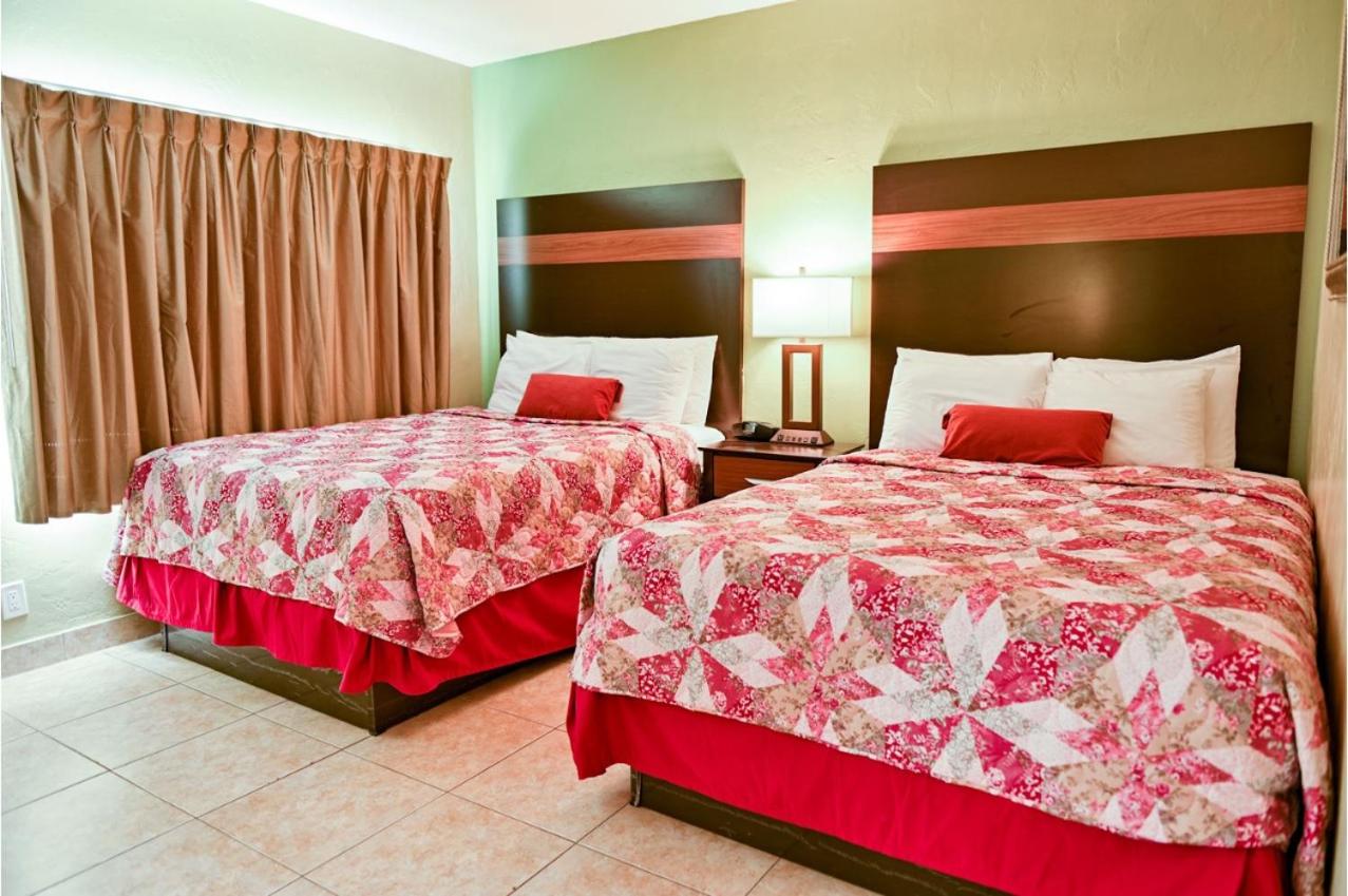 Junior Suite with Two King Beds - Disability Access at Beachcomber Resort & Club