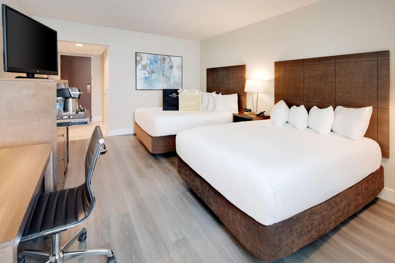2 Queen Beds, Refrigerator, Microwave at Florida Hotel & Conference Center in the Florida Mall