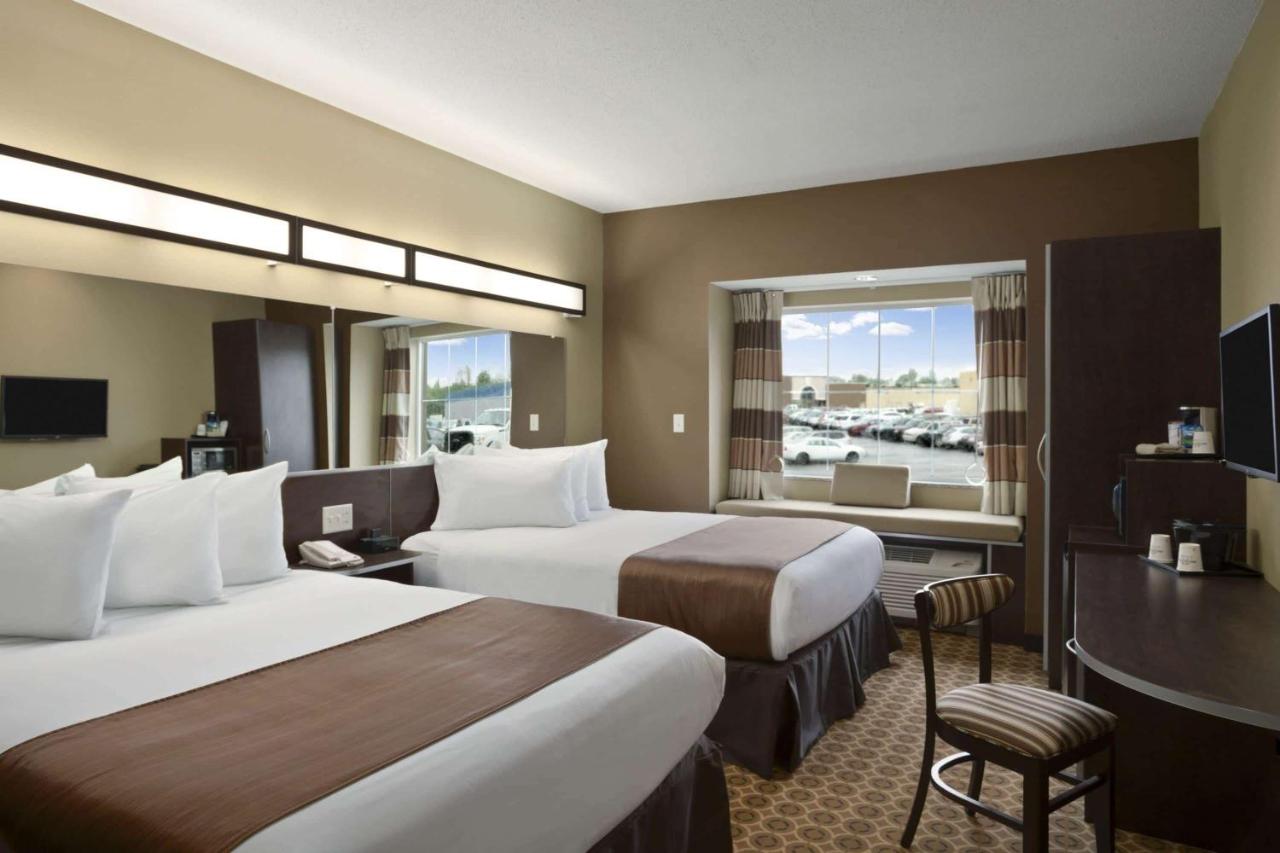 Deluxe Queen Room with Two Queen Beds - Non-Smoking at Microtel Inn & Suites By Wyndham Fairmont