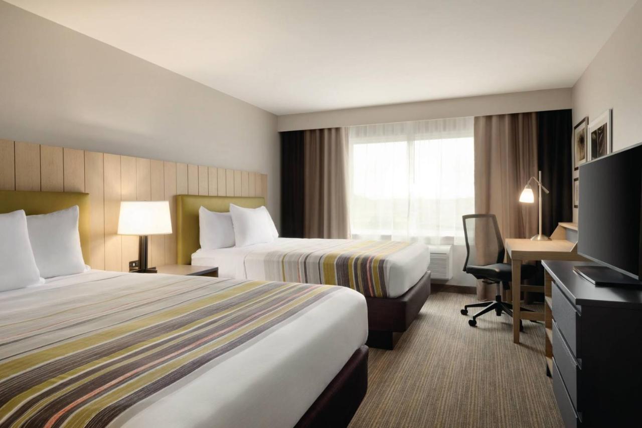 Queen Room with Two Queen Beds - Non-Smoking at Country Inn & Suites by Radisson, Ft. Atkinson, WI