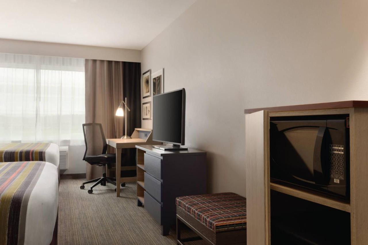 Queen Room with Two Queen Beds - Non-Smoking at Country Inn & Suites by Radisson, Ft. Atkinson, WI