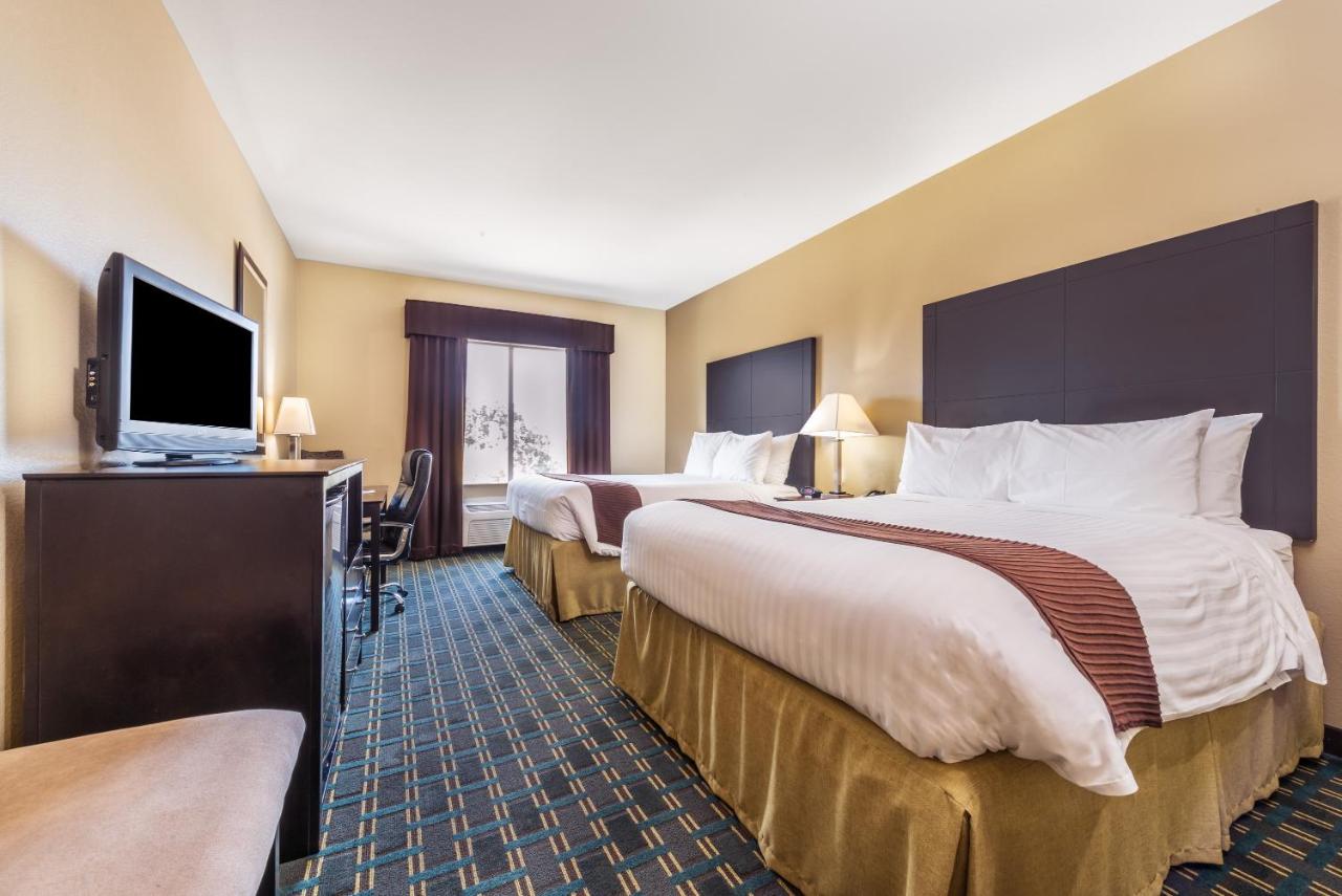 Queen Room with Two Queen Beds -Disability Access - Non-Smoking at Days Inn & Suites by Wyndham Mineral Wells