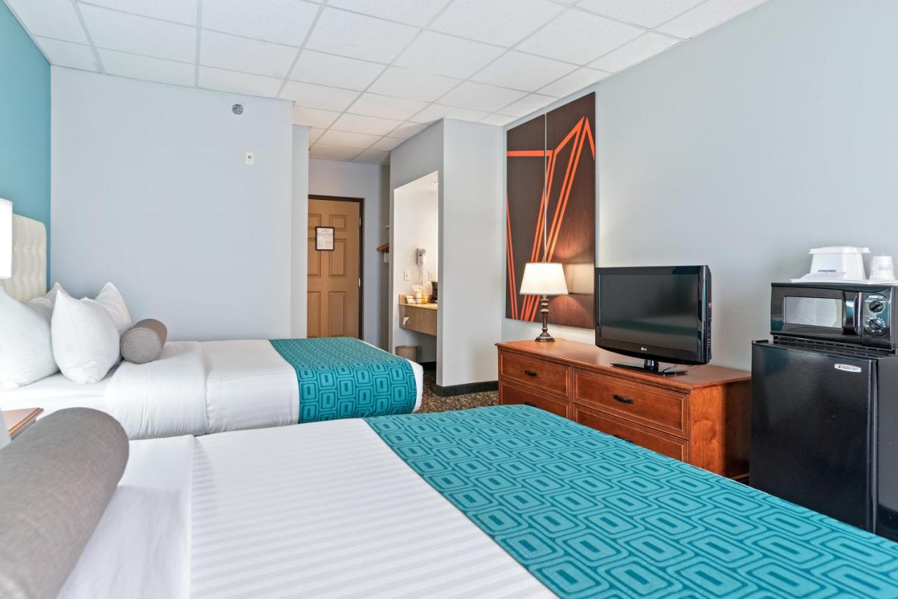Queen Room with Two Queen Beds - Mobility Access/Non-Smoking at Howard Johnson by Wyndham Downtown Rapid City