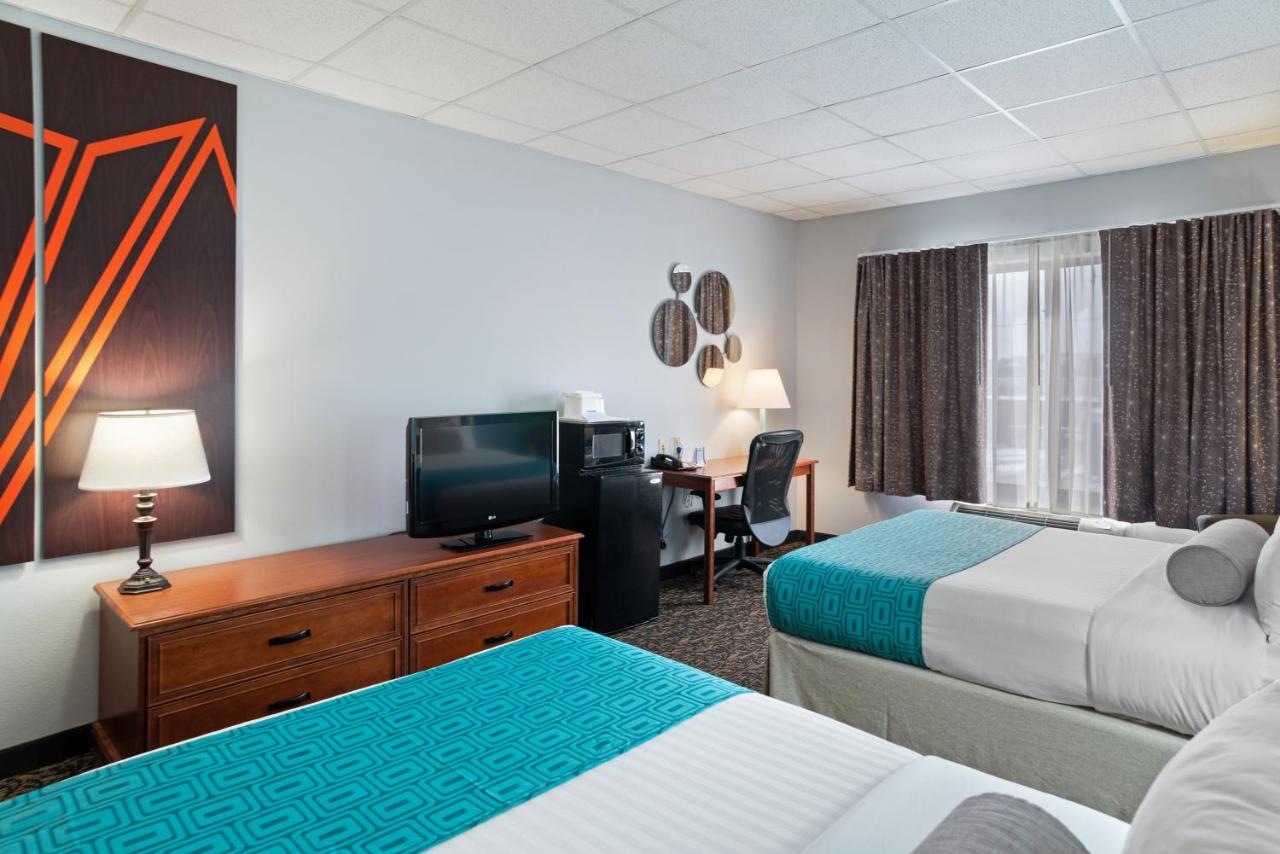 Queen Room with Two Queen Beds - Mobility Access/Non-Smoking at Howard Johnson by Wyndham Downtown Rapid City