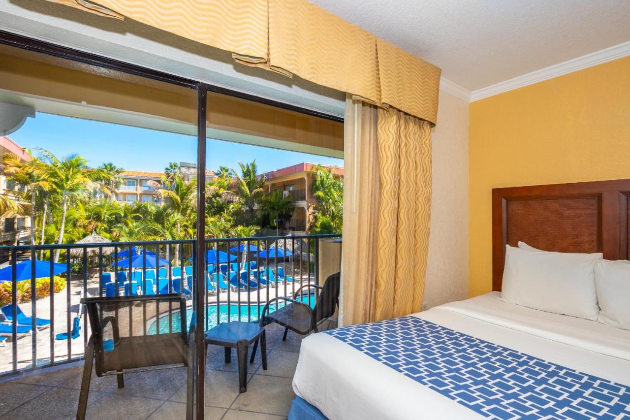 King Suite with Pool View at Coconut Cove All-Suite Hotel