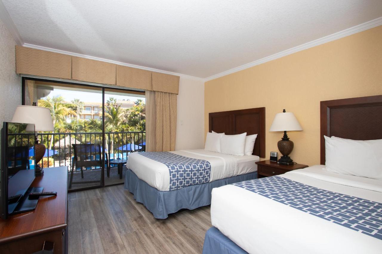 Queen Suite with Pool View at Coconut Cove All-Suite Hotel