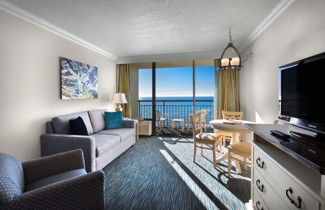 Oceanfront Family Suite - 2 Queen Bed with 1 Double Wall Bed at Coral Beach Resort and Suites