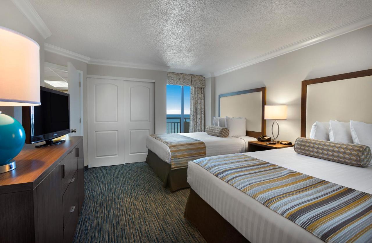 Premium Oceanfront One Bedroom Queen Suite-2 Queen Bed with 1 Double Wall Bed at Coral Beach Resort and Suites