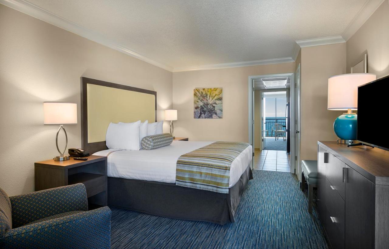 Oceanfront King Suite-1 King Bed with 1 Double Wall Bed at Coral Beach Resort and Suites